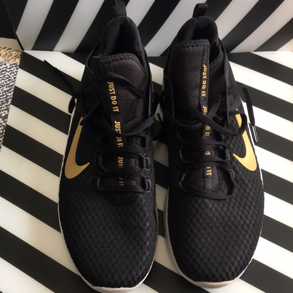 black nike shoes with gold swoosh women's